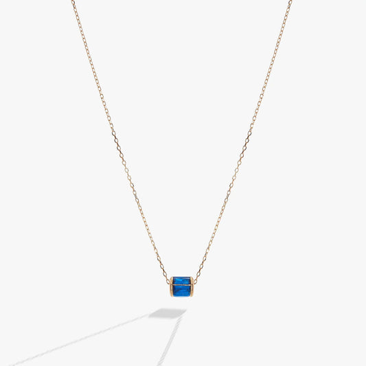 September Birthstone Pendant Necklace with blue stone in gold bezel on rose gold chain on Tampa Home & Garden Store