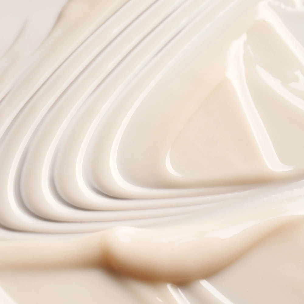 Oribe Serene Scalp Densifying Conditioner creamy ivory texture close-up on Tampa Home & Garden Store