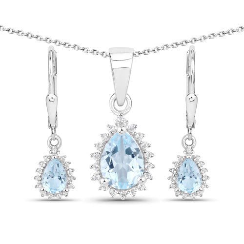 Sterling silver jewelry set with blue topaz drop and white topaz halos, necklace and earrings on Tampa Home & Garden Store
