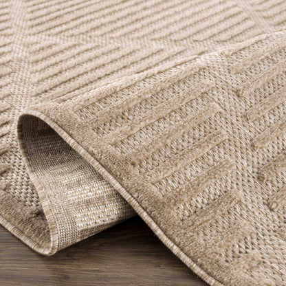 Anah Tan outdoor rug by Boutique Rugs, beige natural jute weave, rolled edge on Tampa Home & Garden Store