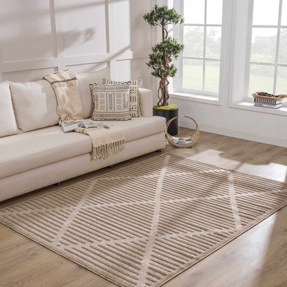 Anah Tan Outdoor Rug by Boutique Rugs; tan woven geometric rug in living room on Tampa Home & Garden Store