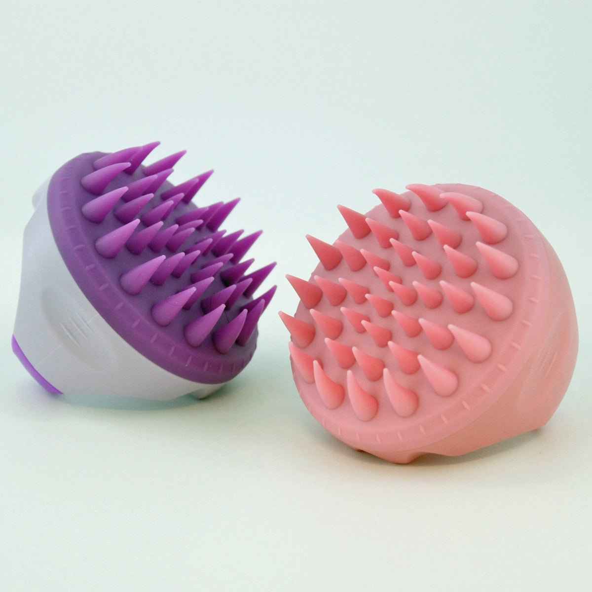 Shaketea scalp massager brush pair with purple and pink bristles for shower hair cleaning on Tampa Home & Garden Store