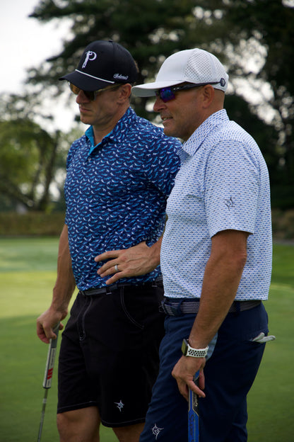 Sharks Polo shirts by White Water Life, blue shark-print polos for men, two shown on course on Tampa Home & Garden Store