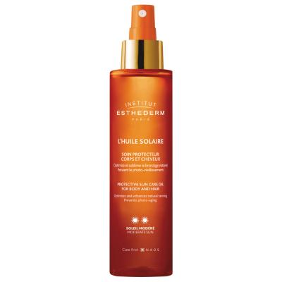 Esthederm sun care oil spray bottle orange with gold cap, sunscreen for skin and hair on Tampa Home & Garden Store
