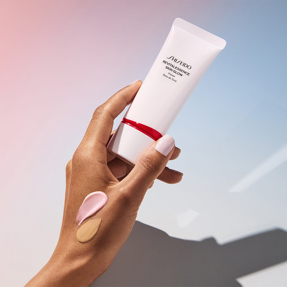 Shiseido Revitalessence Skin Glow Primer 30ml white tube with red band and swatches on skin on Tampa Home & Garden Store