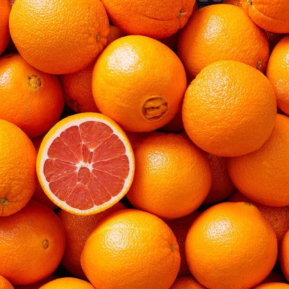 Cara Cara Orange Tree fruits pile; bright orange peels and pink flesh visible on halved orange on Tampa Home & Garden Store