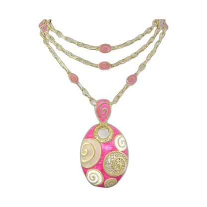 Signature Swirl Necklace pink enamel spirals on goldtone triplestrand chain with crystal pendant on Tampa Home & Garden Store