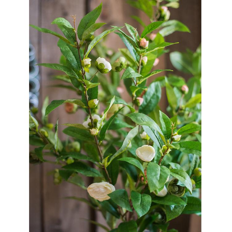 Faux silk camellia leaf stem with green leaves and white blossoms, artificial flora on Tampa Home & Garden Store