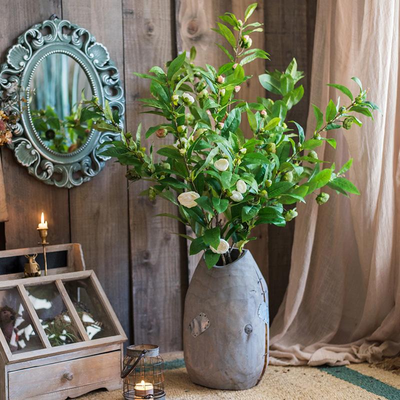 Faux Silk Camellia Flower Leaf Stem in Green with White Blossoms in a RusticReach ceramic vase on Tampa Home & Garden Store