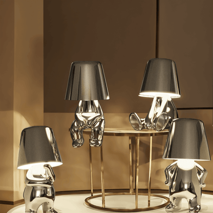 Silver Thinker LED Table Lamps Set with chrome figures and gray shades on a gold base on Tampa Home & Garden Store