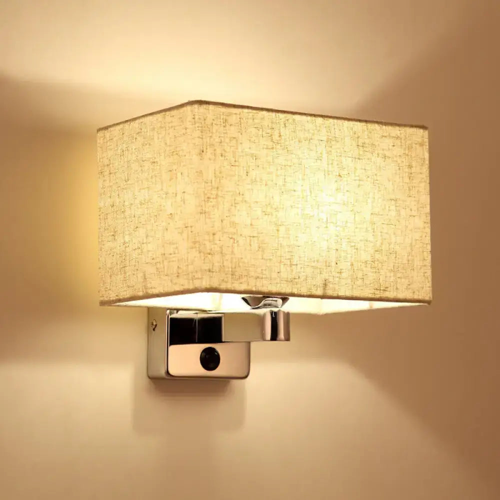 Flaxen Modern Wall Lamp with linen shade and polished chrome mount, warm ambient light on Tampa Home & Garden Store