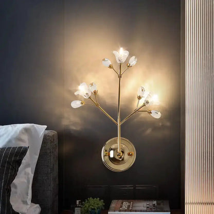 Simple gold crystal flowers wall sconce by Decorbites, branch-style bedroom light fixture on Tampa Home & Garden Store