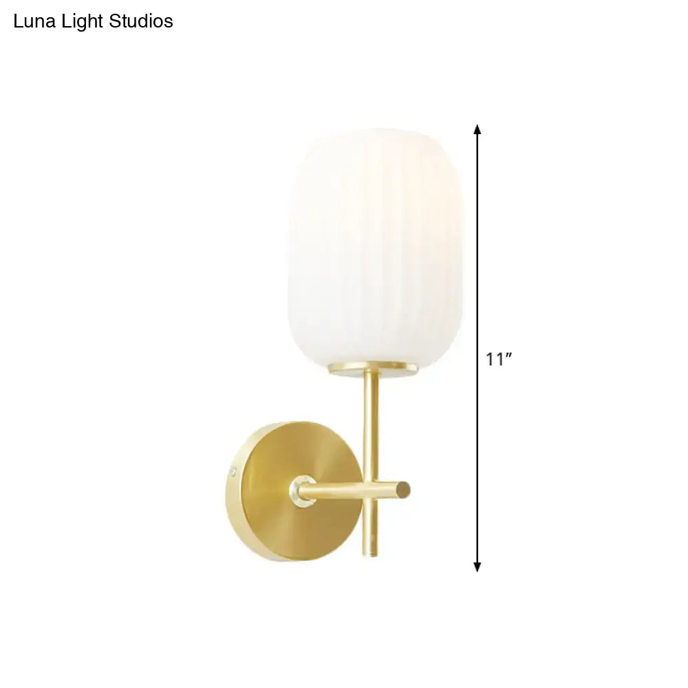 Gold glass cream lantern sconce Decorbites with frosted white glass shade brass finish on Tampa Home & Garden Store