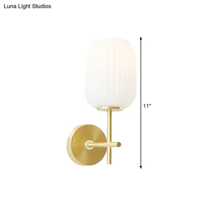 Gold glass cream lantern sconce Decorbites with frosted white glass shade brass finish on Tampa Home & Garden Store