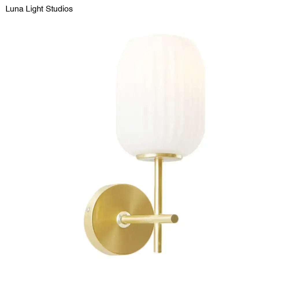 Gold glass cream lantern wall sconce by Decorbites with brass backplate, single light on Tampa Home & Garden Store