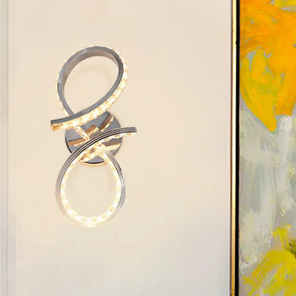 Chrome Infinity Wall Sconce with intertwined LED rings in a chrome finish, Decorbites on Tampa Home & Garden Store