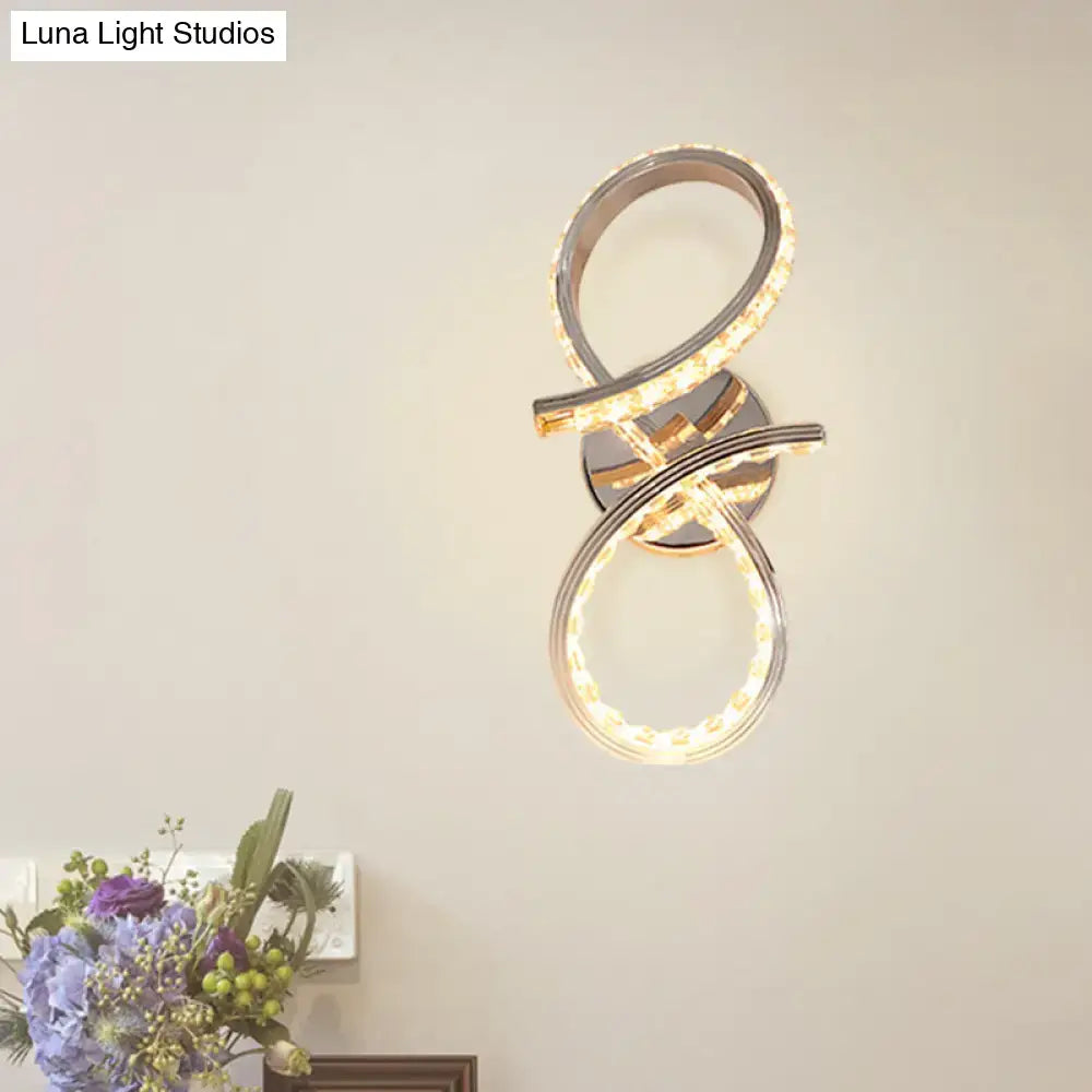 Chrome Infinity Wall Sconce by Decorbites with intertwined chrome rings and LED illumination on Tampa Home & Garden Store