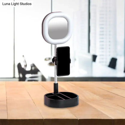 Light Blue LED Vanity Light with square mirror, phone mount, and black round base by Decorbites on Tampa Home & Garden Store