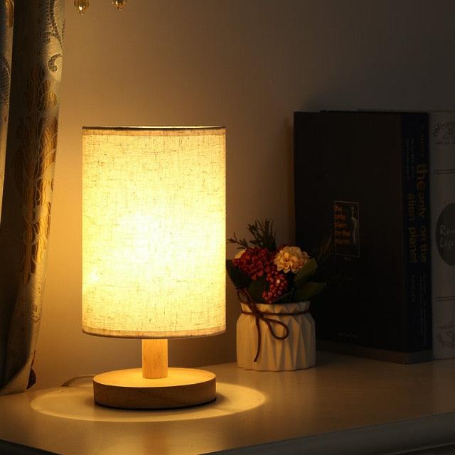 Stevvex bedside table lamp with beige fabric shade and solid wood base on Tampa Home & Garden Store