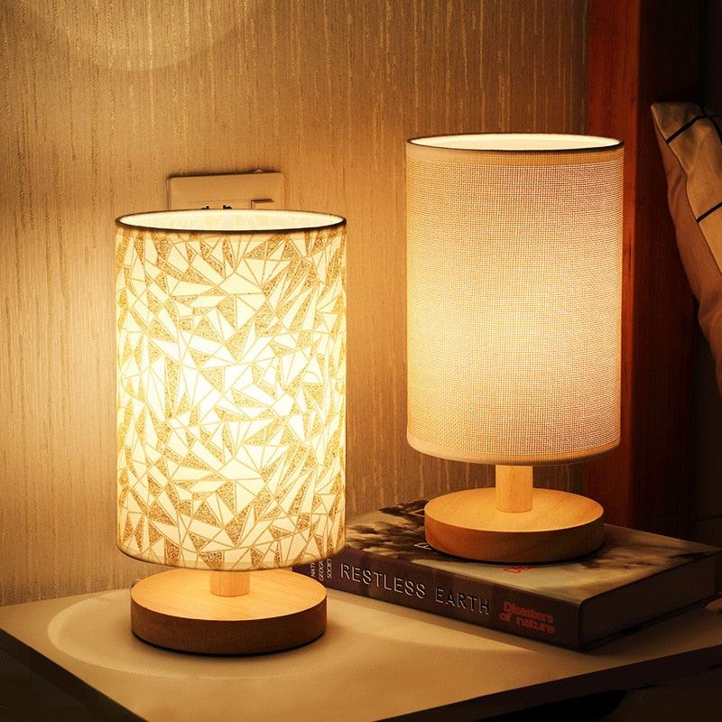 Stevvex table lamp pair with solid wood bases; geometric patterned shade and plain woven shade, warm bedside glow on Tampa Home & Garden Store