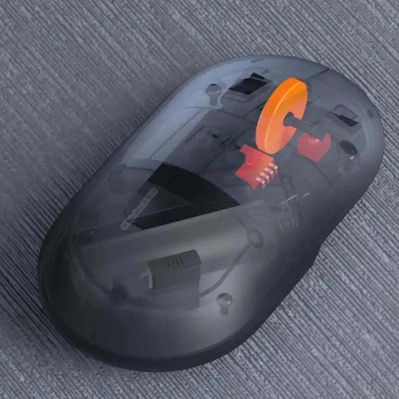 Stevvex wireless optical mouse with transparent shell and orange scroll wheel on Tampa Home & Garden Store