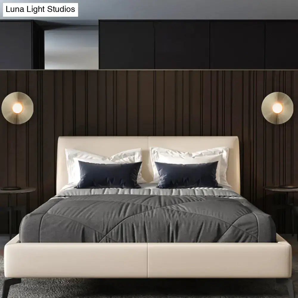 Decorbites Brushed Brass Wall Sconce, pair with disc lights on wood panels beside bed on Tampa Home & Garden Store
