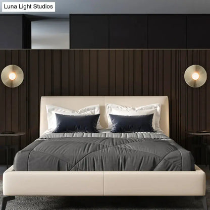 Decorbites Brushed Brass Wall Sconce, pair with disc lights on wood panels beside bed on Tampa Home & Garden Store