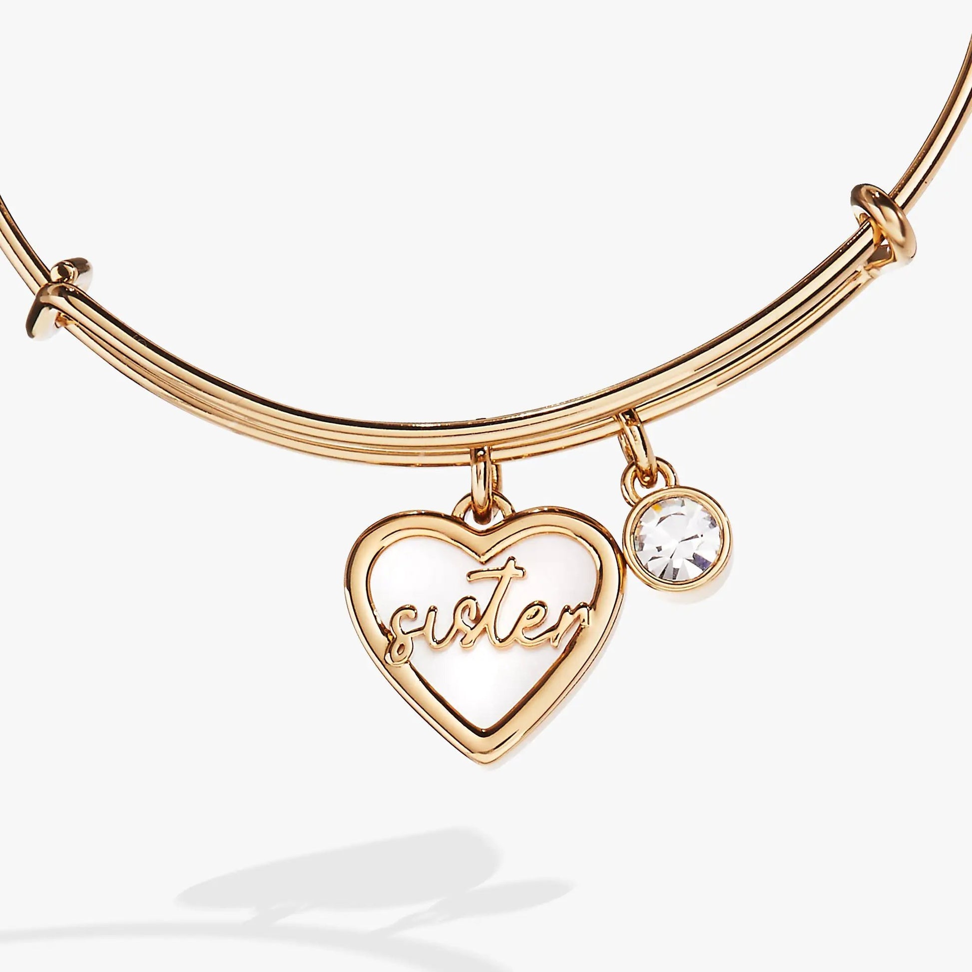 Sister Mother of Pearl Bangle bracelet by Alex and Ani with heart and crystal charms in rose gold on Tampa Home & Garden Store