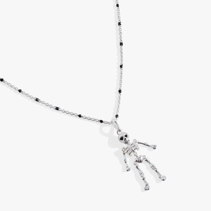 Skeleton necklace by ALEX AND ANI with a silver chain, black bead accents, and skeleton pendant on Tampa Home & Garden Store