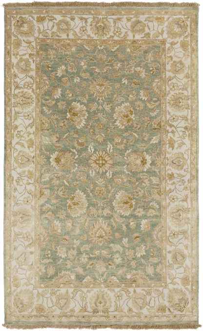 Skipwith Area Carpet rug by Boutique Rugs, teal center with ivory floral border and fringe on Tampa Home & Garden Store