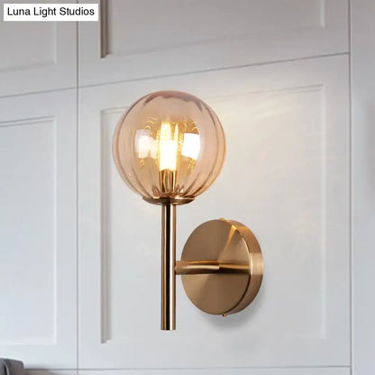Amber Red Green Glass Wall Sconce with amber glass globe and brass finish on Tampa Home & Garden Store