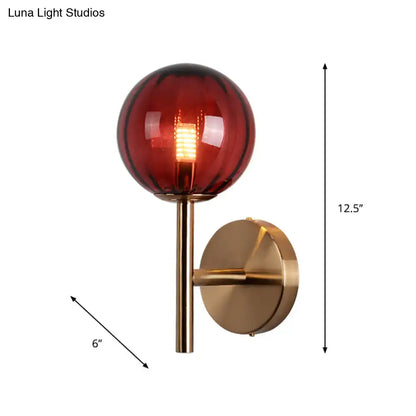 Amber red glass wall sconce with brass finish by Decorbites, 12.5in tall on Tampa Home & Garden Store