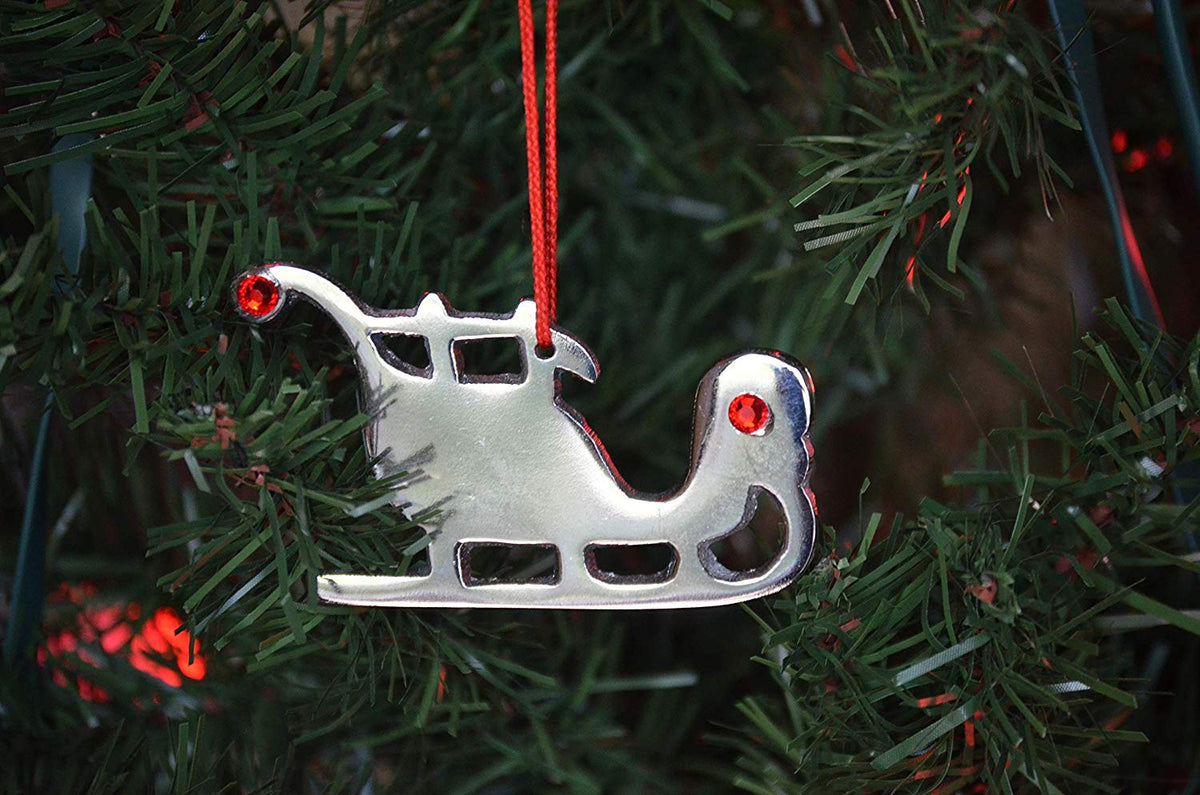 Vibhsa sleigh Christmas tree ornament, silver with red crystals and red hanging string on Tampa Home & Garden Store