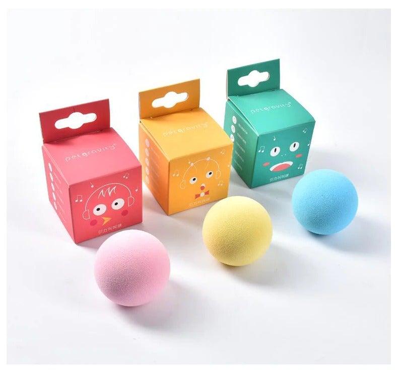 Stevvex interactive cat ball toy set with pink, yellow, and blue plush balls and cartoon boxes on Tampa Home & Garden Store