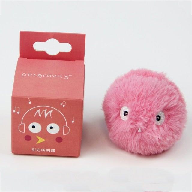 Smart cat toy ball with pink fluffy fur and squeaky chirp, Stevvex, beside pink packaging on Tampa Home & Garden Store