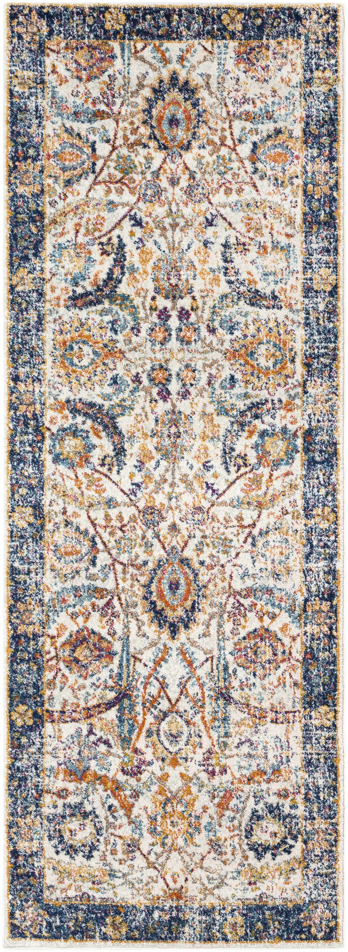 Smyrna Area Rug by Boutique Rugs, ivory field with navy border and colorful medallion motif on Tampa Home & Garden Store