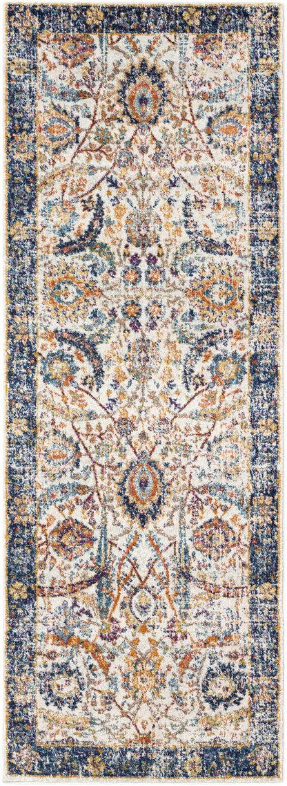 Smyrna Area Rug by Boutique Rugs, ivory field with navy border and colorful medallion motif on Tampa Home & Garden Store