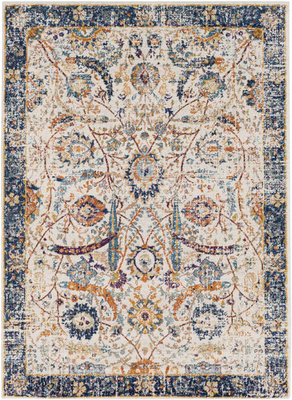 Smyrna Area Rug by Boutique Rugs with navy border, cream field, and orange floral motifs on Tampa Home & Garden Store