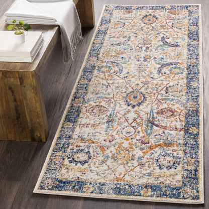 Smyrna Area Rug by Boutique Rugs with blue border and cream multicolor oriental pattern on Tampa Home & Garden Store