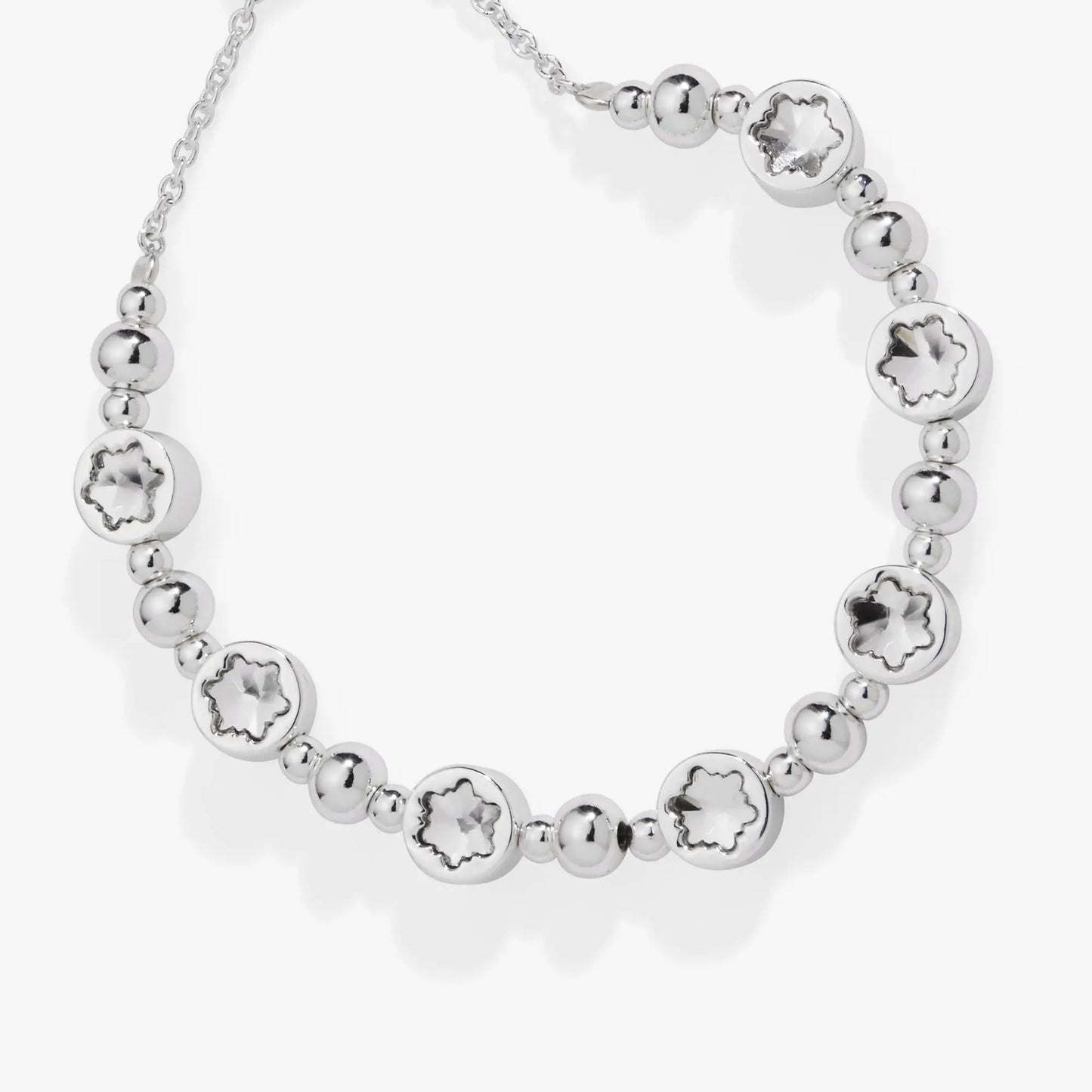 Silver bolo bracelet featuring round snowflake-cut discs and polished beads on Tampa Home & Garden Store