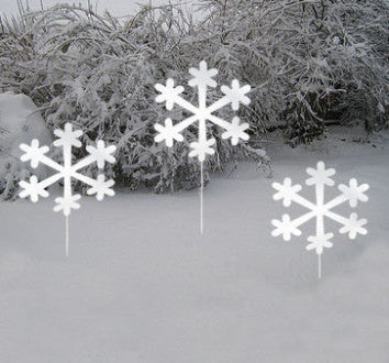 Snowflake Decorations set of 3 on stakes in a snowy yard with evergreen backdrop on Tampa Home & Garden Store