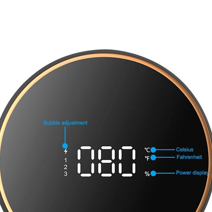 Circular black display soap dispenser wall unit with orange rim and digital readout on Tampa Home & Garden Store