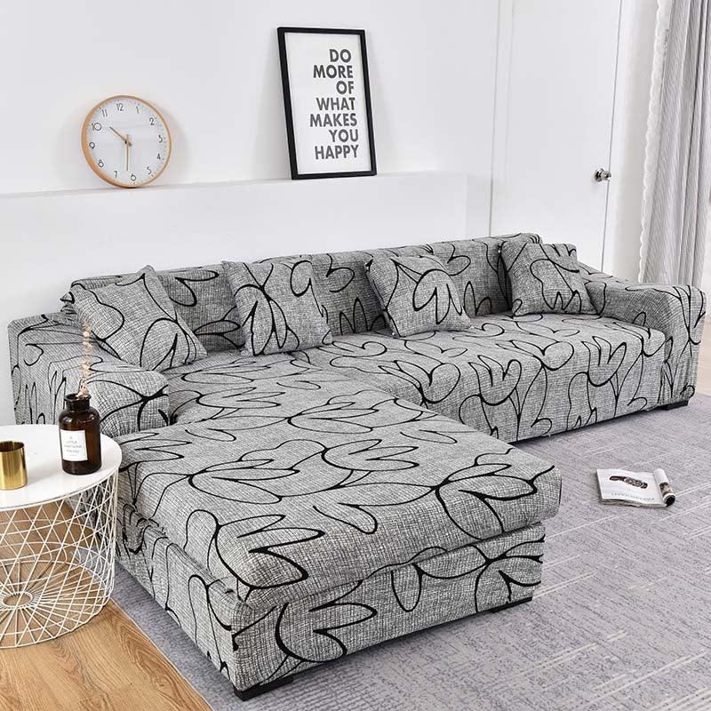 Stevvex sofa cover with elastic bottom for L-shaped chaise lounge in gray jacquard on Tampa Home & Garden Store