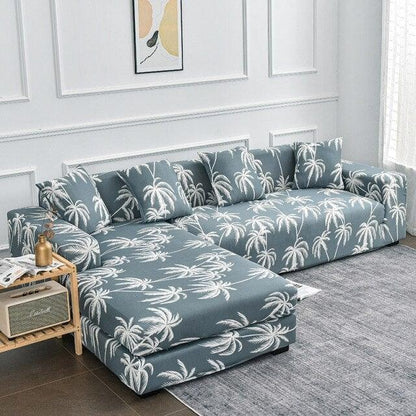 Stevvex L-shaped sofa slipcover in blue-gray palm-tree jacquard with elastic bottom on Tampa Home & Garden Store