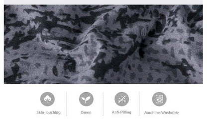 Stevvex sofa cover in gray jacquard with elastic bottom for L-shaped chaise lounge on Tampa Home & Garden Store