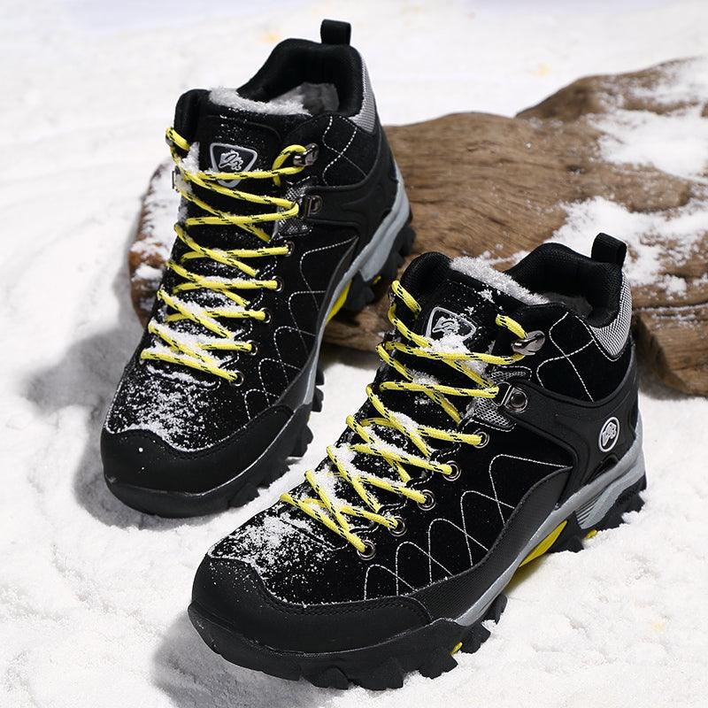 Stevvex black winter fur-lined boots with yellow laces and rugged outsole, 2 boots on snow on Tampa Home & Garden Store