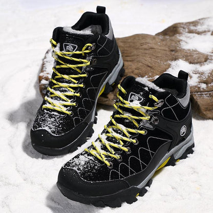 Stevvex black winter fur-lined boots with yellow laces and rugged outsole, 2 boots on snow on Tampa Home & Garden Store