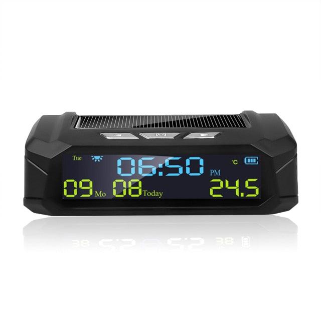 Stevvex solar car clock with LCD time/date and in-car temp display, black unit with blue LED on Tampa Home & Garden Store