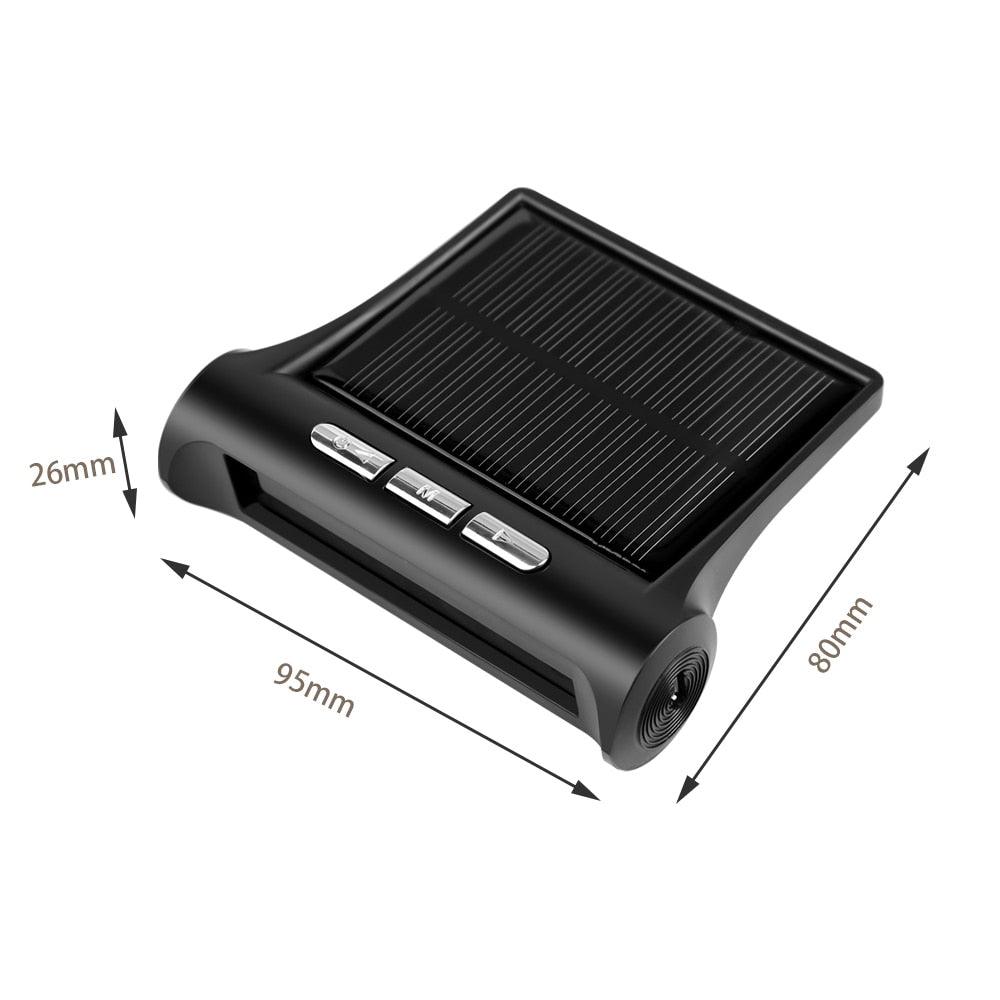 Stevvex solar car clock with solar panel top, black body and three chrome buttons on Tampa Home & Garden Store