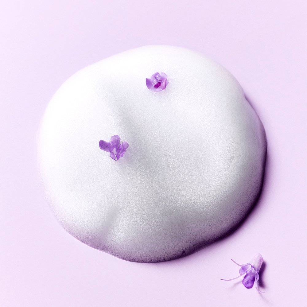 Bubble toner white foam on lavender background with lilac blossoms, Seoulia toner on Tampa Home & Garden Store